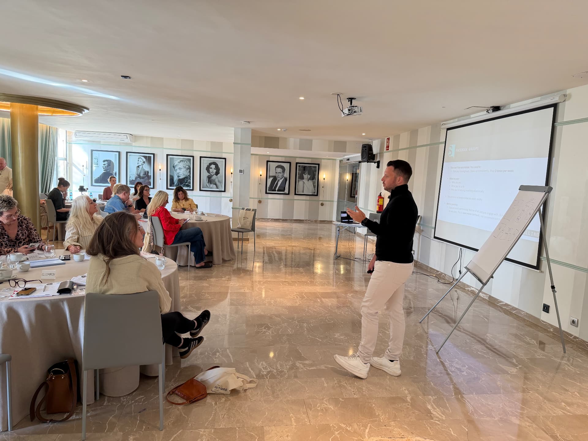 Chris Taylor leading a marketing workshop with a group of business owners